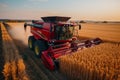 A combine harvester in full action on a lush crop field