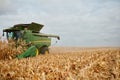 Combine harvester harvesting corn Royalty Free Stock Photo