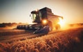 Combine harvester harvesting ripe wheat on big wheat field and tractor Royalty Free Stock Photo