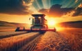 Combine harvester harvesting ripe wheat on big wheat field and tractor Royalty Free Stock Photo