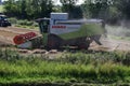 Combine Harvester Harvesting Wheat, Forncett, Norfolk, England, UK Royalty Free Stock Photo