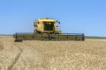 A combine harvester reaping a wheat crop in Australia.