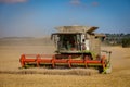 Combine Harvester at work in the Lincolnshire Fens Royalty Free Stock Photo