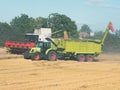 Combine Harvester Unloading Grain