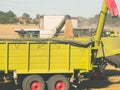 Combine Harvester Unloading Grain