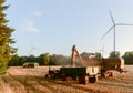 Combine harvester unloads wheat grain Royalty Free Stock Photo