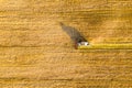 Combine harvester in wheat field. Bird eye view Royalty Free Stock Photo