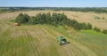 Combine harvester on wheat field