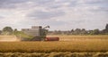 Combine Harvester Working in Field