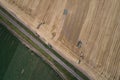 Combine harvester working in golden wheat field