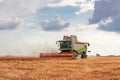 Combine harvester working on a wheat field. Harvesting wheat Royalty Free Stock Photo