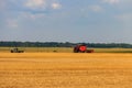 Combine harvester working on wheat field. Harvesting the wheat. Agriculture concept Royalty Free Stock Photo