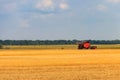 Combine harvester working on wheat field. Harvesting the wheat. Agriculture concept Royalty Free Stock Photo