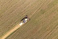 Combine Harvesting a Fall Corn Field Aerial