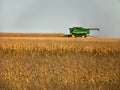 Combine harvesting fall crop of corn in New York State