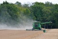 Combine harvesting soy beans