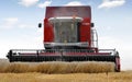 Combine harvesting wheat Royalty Free Stock Photo