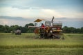 Combine harvesting the wheat