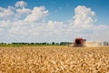 Combine harvesting wheat. Royalty Free Stock Photo