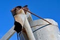 Combine hopper arm detail with deep blue sky