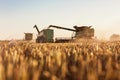 Combine reloading grain into tractor trailer