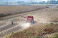 Combine in soybean field Royalty Free Stock Photo