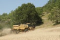 Combined Harvester On Hill