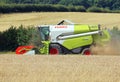 Combined Harvester in a wheat field.