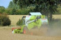 Combined Harvester in a wheat field.