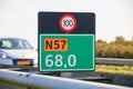 Combined kilometer marker and speed limit sign in the Netherlands