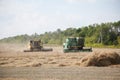 The combines to harvest on the field.