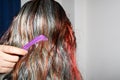 Combing colourful hair