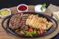 Combo Fajita; top down photo of mexican steak and chicken fajitas in iron skillet with corn tortillas Royalty Free Stock Photo