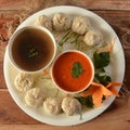 Combo of Veg steam momo and veg soup, Nepalese Traditional dish Momo stuffed with vegetables and then cooked and served with sauce