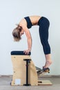 Combo wunda pilates chair woman fitness yoga gym Royalty Free Stock Photo