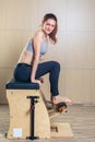 Combo wunda pilates chair woman fitness yoga gym Royalty Free Stock Photo