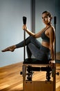 Combo wunda pilates reformer chair woman instructor close-up. Fitness Yoga Gym Exercise. Copy space. sports banner Royalty Free Stock Photo