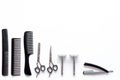 Combs and hairdresser tools in beauty salon on white background top view copyspace Royalty Free Stock Photo