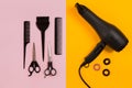 Combs and hairdresser tools on color background top view Royalty Free Stock Photo