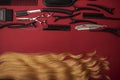 Combs and hairdresser tools on red background top view Royalty Free Stock Photo