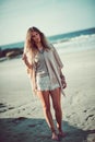 Always come comfy to the beach. an attractive young woman spending a day at the beach.