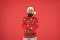 Come get ready for Christmas. bearded man santa hat red wall. christmas time. male xmas party glasses. happy new 2020 Royalty Free Stock Photo