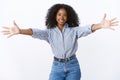 Come let me hug you. Portrait friendly-looking attractive female african american friend give warm welcome wanna embrace