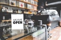 Come in we`re open in cafe owner open startup with cafe shop