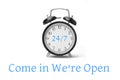 Come in we`re OPEN sign in blue and white, on shop door Royalty Free Stock Photo