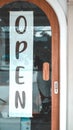 Come in we`re open sign, on cafe or restaurant hang on door at entrance. Royalty Free Stock Photo