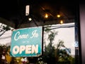 Come In We`re Open sign on door of coffee shop. Royalty Free Stock Photo