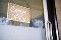 Come in we`re open, vintage retro sign in cafe front Royalty Free Stock Photo