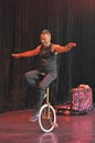 Comedy juggling and unicycle act show Royalty Free Stock Photo