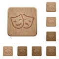 Comedy and tragedy theatrical masks wooden buttons Royalty Free Stock Photo